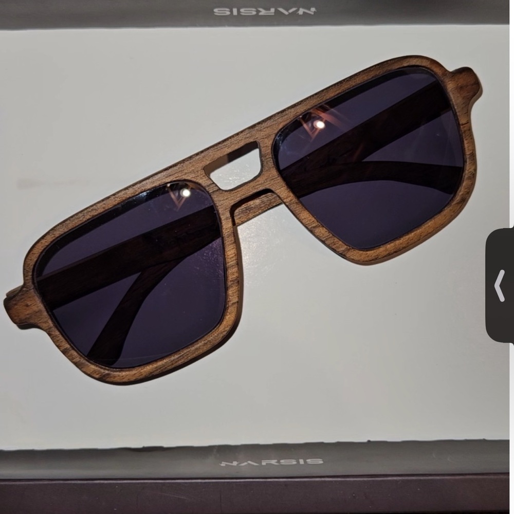 Handmade glasses with walnut tree frame.